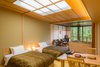 Japanese style twin bed room with open air bath